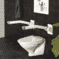 Barre d'appui pour toilettes Etac Rex