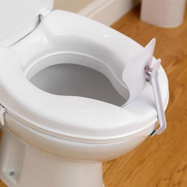 Déflecteur pour toilettes