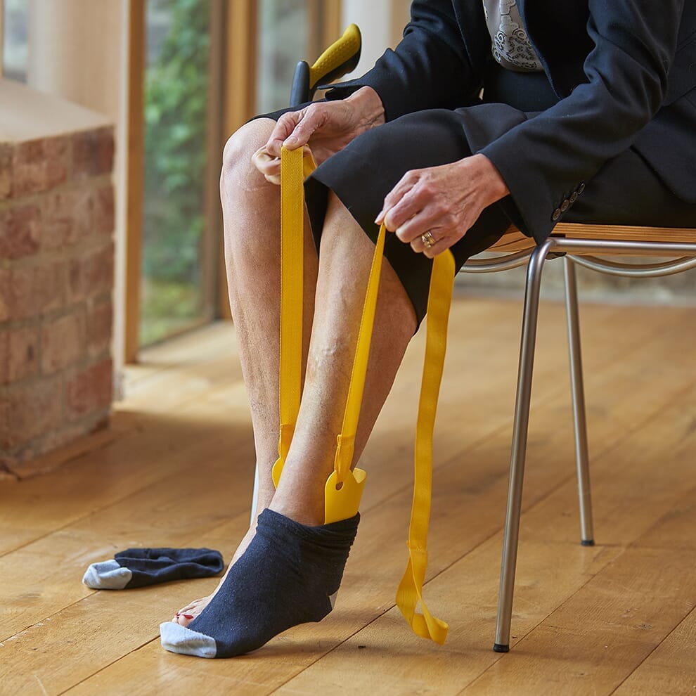 Enfile-chaussettes et bas Foxy