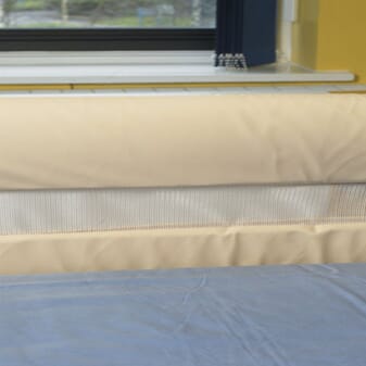 Protections pour barrière de lit