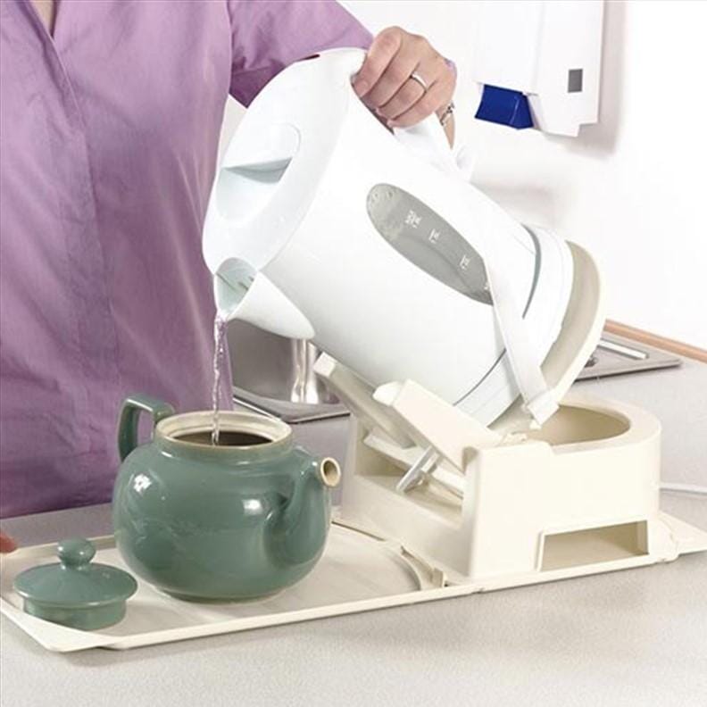 Socle à bascule pour bouilloire sans fil