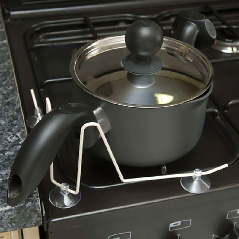 Support sécurisé pour manche de casserole