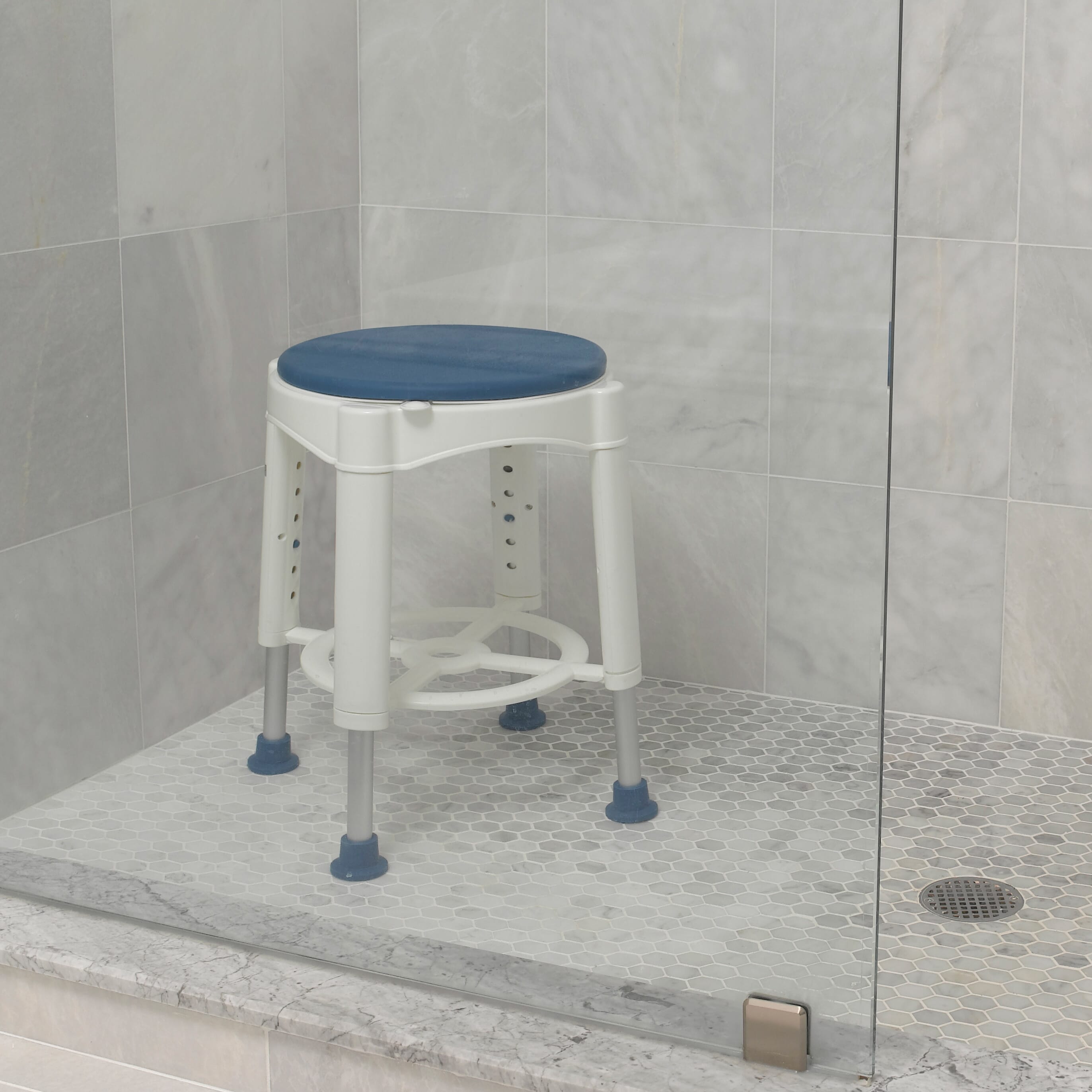 Tabouret de bain pivotant avec siège rembourré